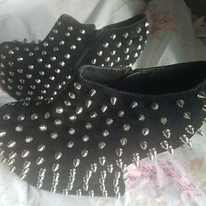 Black faux suade spike wedges
